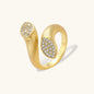 Open-band gold-plated ring with two oval pavé zirconia sections positioned at opposite ends, adjustable design